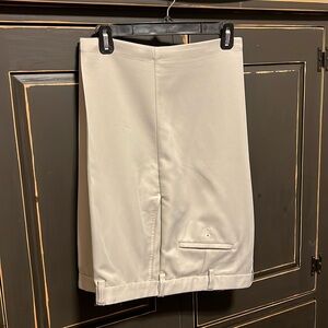 Haggar, tan flat front shorts size 38
